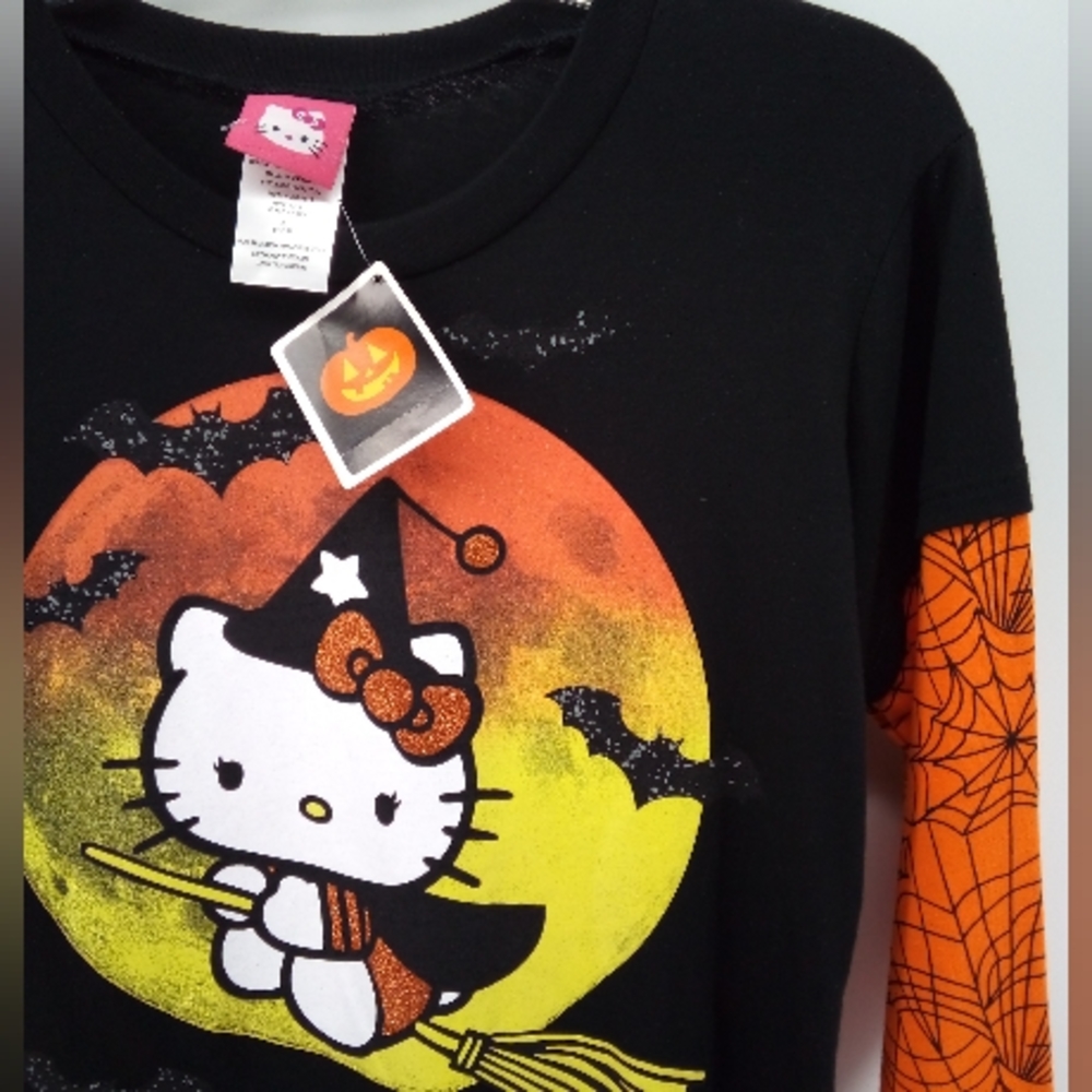 NWT Hello Kitty Sanrio Halloween Witch Riding Broom Glitter Spider Web Sleeves L